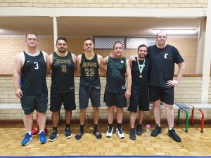 Mark with his basketball team