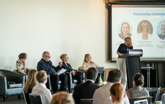 Panel presenting at a forum.